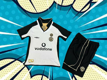 Manchester United. Kit Niño reversible 2000-2001